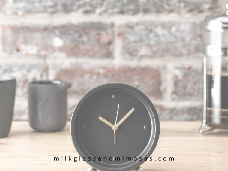 clock and french press coffee